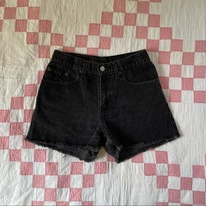 Vintage Levi’s high waisted cutoff shorts in black denim. Perfectly worn in.